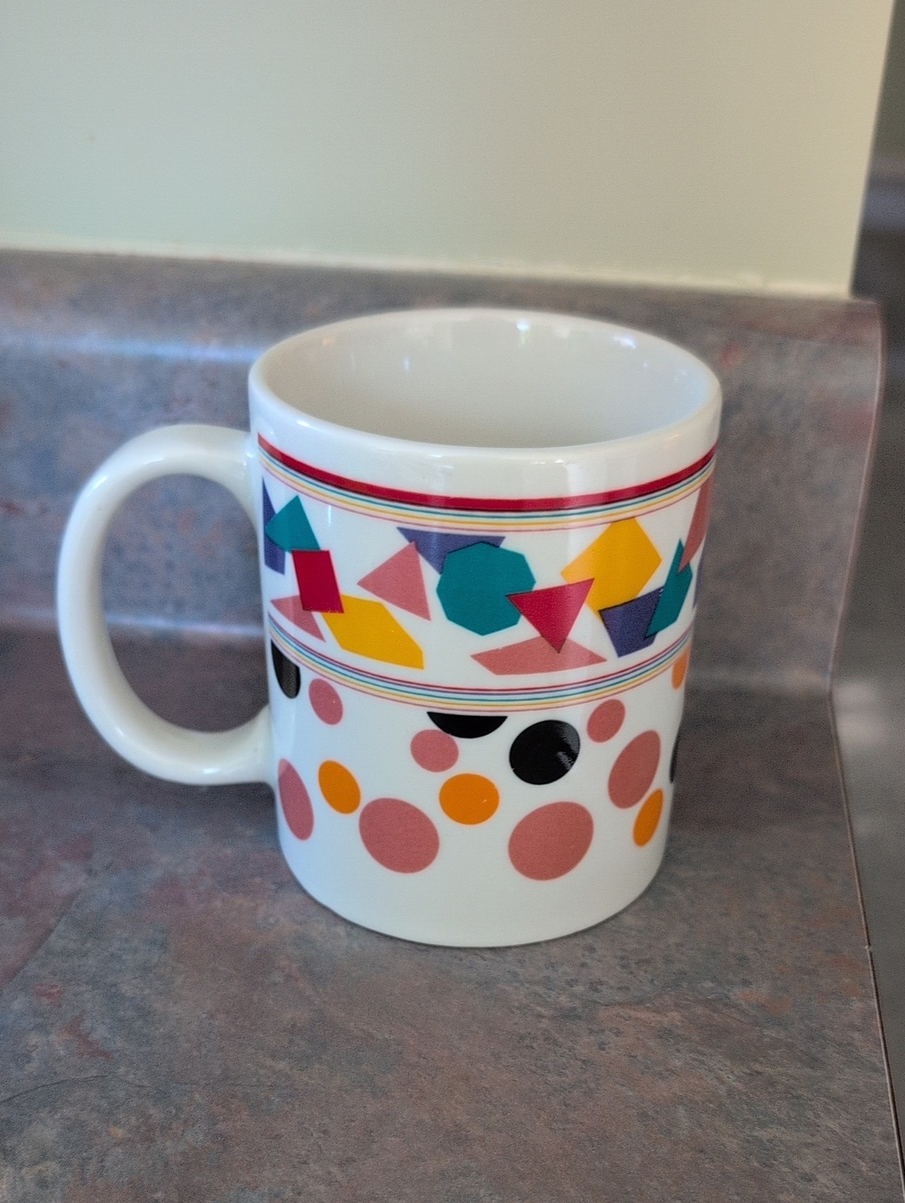 White Ceramic Mug with Multicolor Geometric & Polka Dot Design